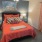 a bedroom with a large bed