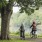 two people riding bikes
