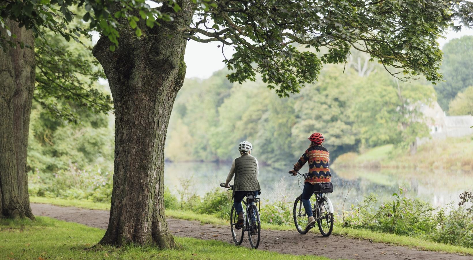 Find your perfect fit at Saw Mill Village two people riding bikes