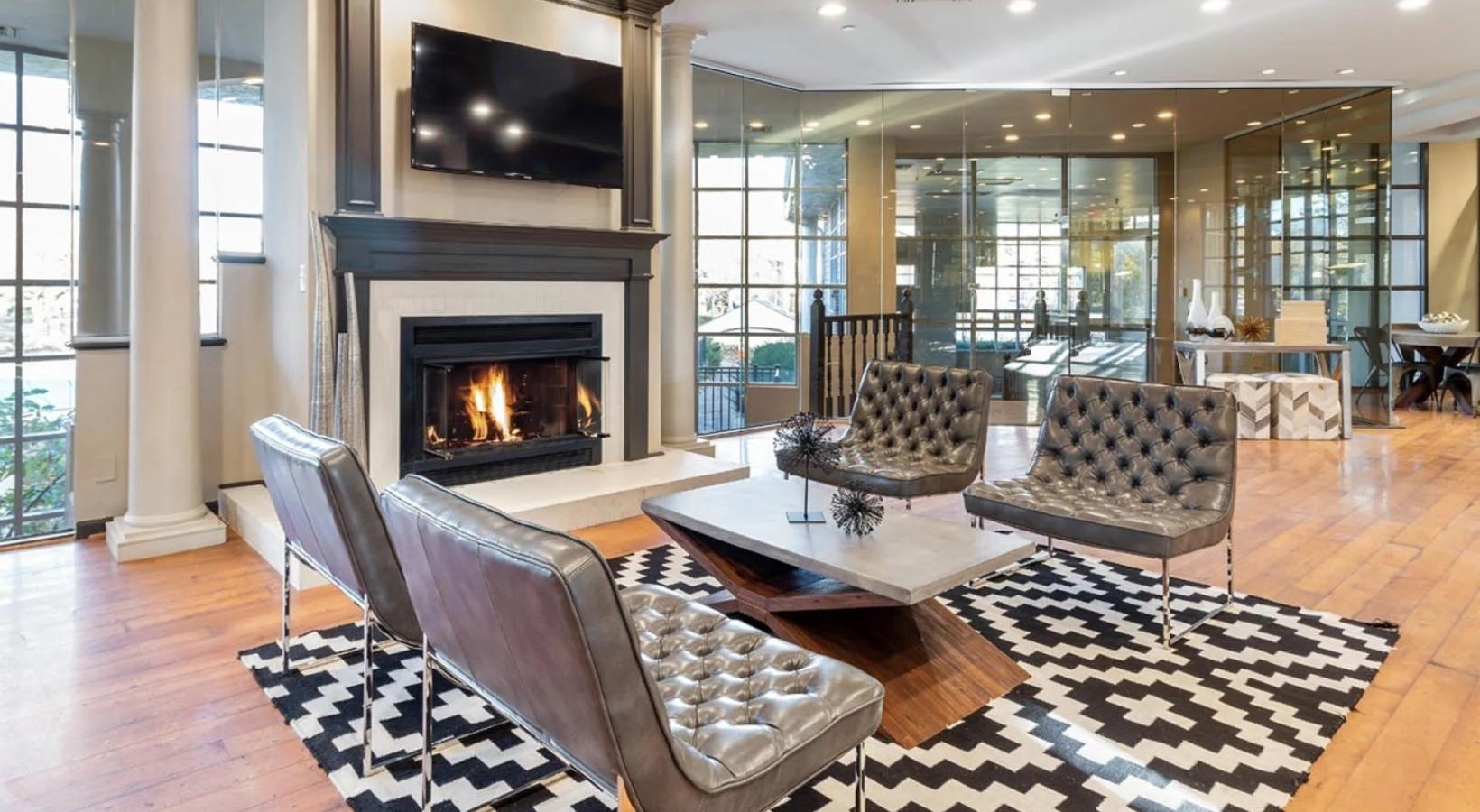 Enjoy our resident-only features a living room with a fireplace