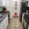 a kitchen with white cabinets