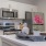 a kitchen with white cabinets and a white counter top