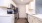 a kitchen with white cabinets