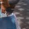 a person holding a few bags