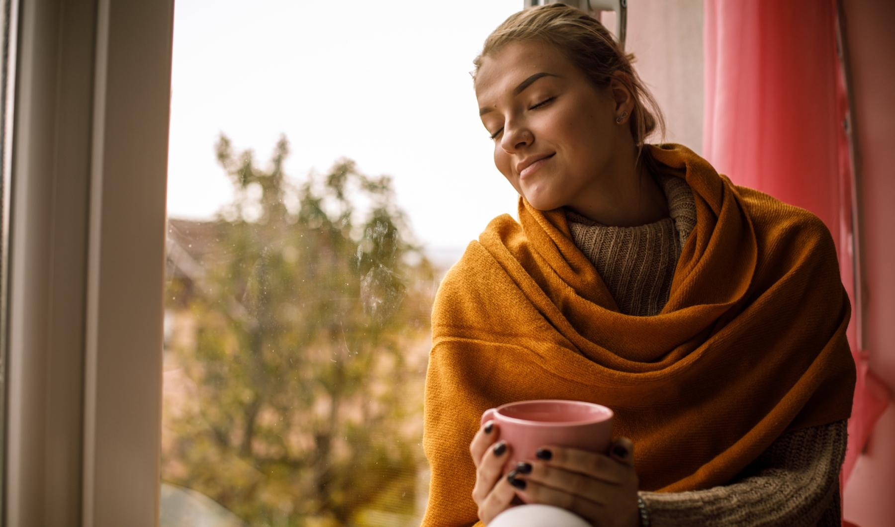 Find your perfect fit at Saw Mill Village a person holding a cup