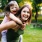a woman holding a child